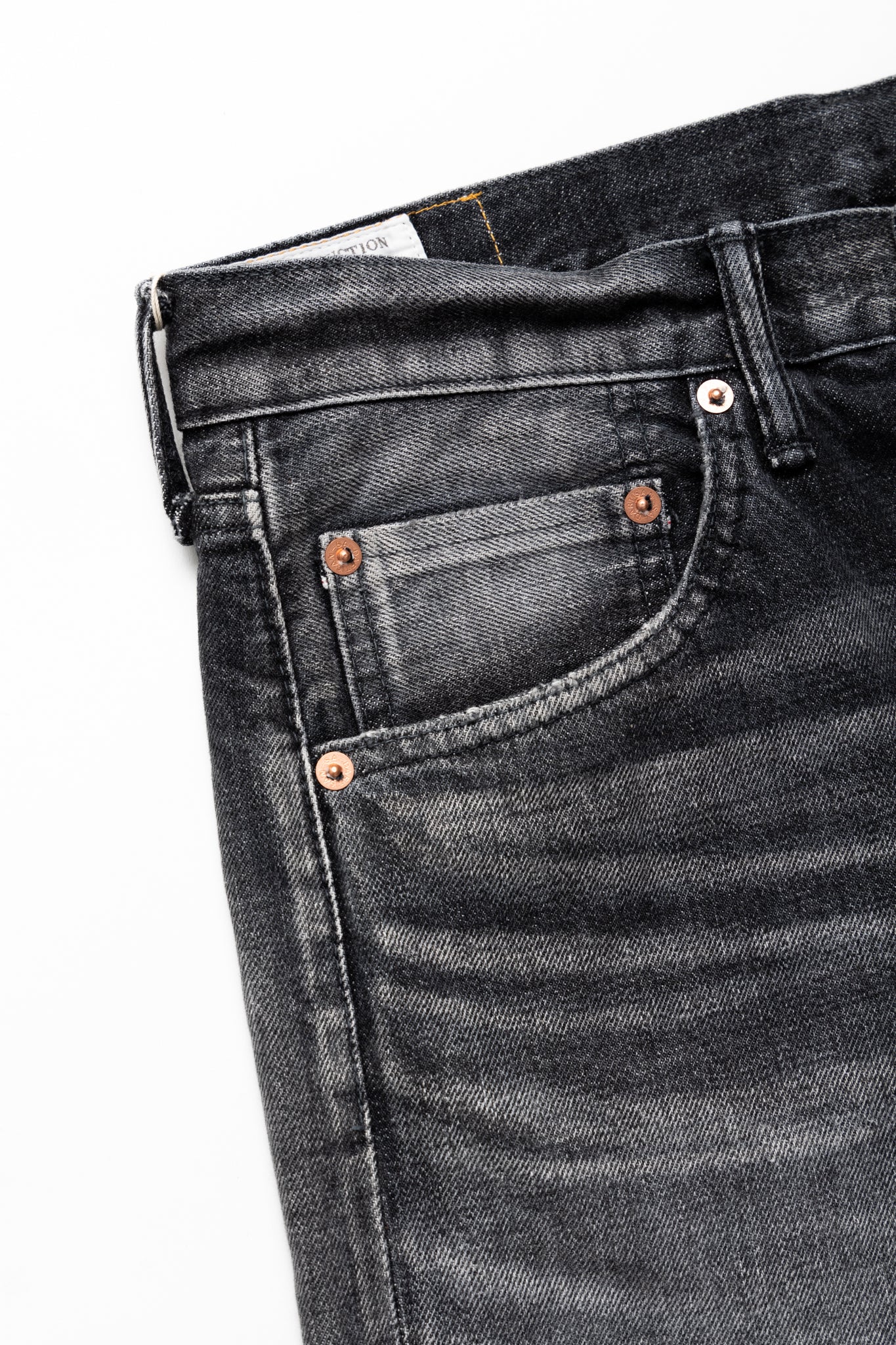 Studio D'Artisan Original Japanese Selvedge denim - 13oz in a Relaxed Taper Fit. Color: Faded Black. Distressed and Rope dyed 