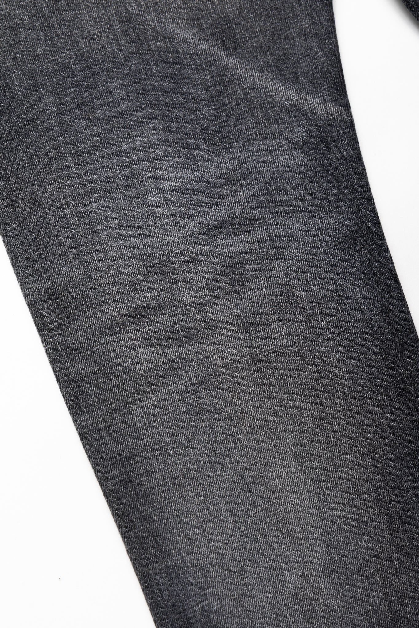 Studio D'Artisan Original Japanese Selvedge denim - 13oz in a Relaxed Taper Fit. Color: Faded Black. Distressed and Rope dyed 