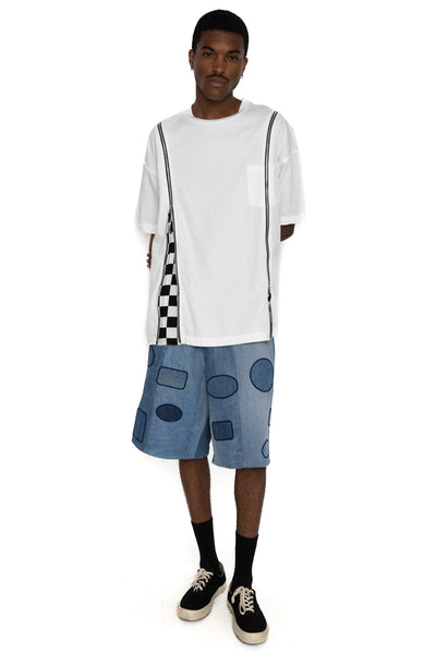  OLD PARK's x MINEDENIM's original denim T-shirt made from 6oz natural slub light ounce denim. Various silhouettes can be adjusted by opening and closing the zipper that runs from the shoulder to the hem. Loose silhouette denim T-shirt 