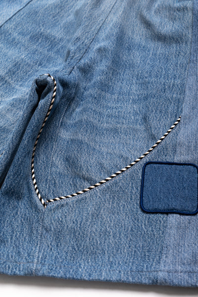 OLD PARK x MINEDENIM original collaboration shorts reconstructed using scraps of vintage jeans. Randomly arranged denim patches made from used denim 