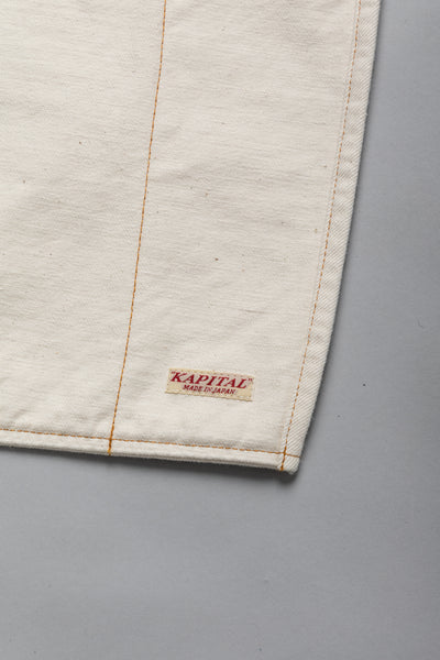 Kapital 2023 Spring Summer advertising apron with a vintage-like logo 3 pockets with different sizes. Featured on the apron is yellow Novelty typography. 13oz distressed denim. Color: Ecru 100% Cotton Made in Japan. 