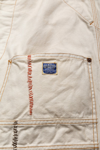 Made by Kapital are lumber pants inspired by overalls. Intricate stitching and intentional distressed details throughout front on pants. Loose fit. 100% Cotton. Made in Japan 