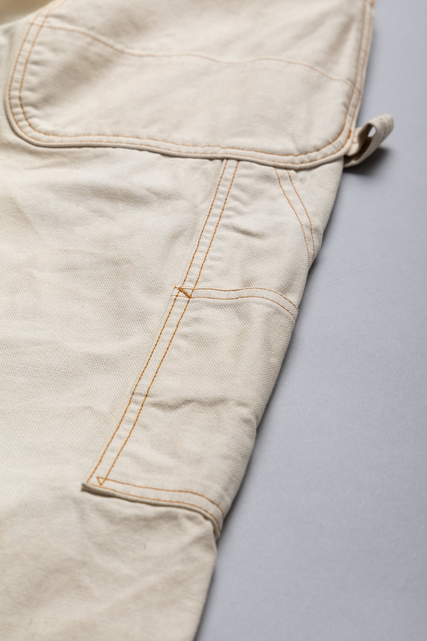 Made by Kapital are lumber pants inspired by overalls. Intricate stitching and intentional distressed details throughout front on pants. Loose fit. 100% Cotton. Made in Japan 