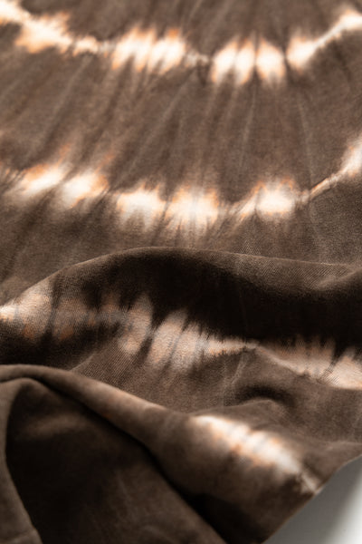 Studio D'Artisan hand dyed t-shirt.The ancient dyeing method, Amami Mud Dyeing, has a gentle, deep, powerful, and astringent color that cannot be synthesized with chemical dyes. 100% cotton. Made In Japan 