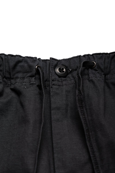 Orslow's easy to wear trousers with an elastic waist and cord drawstring made in Japan. 100% cotton ripstop fabric. Straight leg with a slight taper that features two front pockets and one back. 