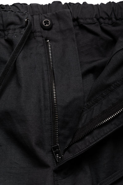 Orslow's easy to wear trousers with an elastic waist and cord drawstring made in Japan. 100% cotton ripstop fabric. Straight leg with a slight taper that features two front pockets and one back. 