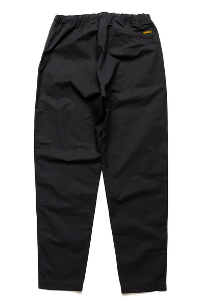 Orslow's easy to wear trousers with an elastic waist and cord drawstring made in Japan. 100% cotton ripstop fabric. Straight leg with a slight taper that features two front pockets and one back. 
