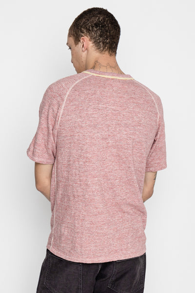 From Loop & Weft is an uneven heather slub knit. Vintage Inspired Double binder neck Set-in on the front and raglan sleeve on the back. Cotton thread stitching. Color: Red Cherry. One wash. Unisex regular fit. 100% cotton. Made in Japan