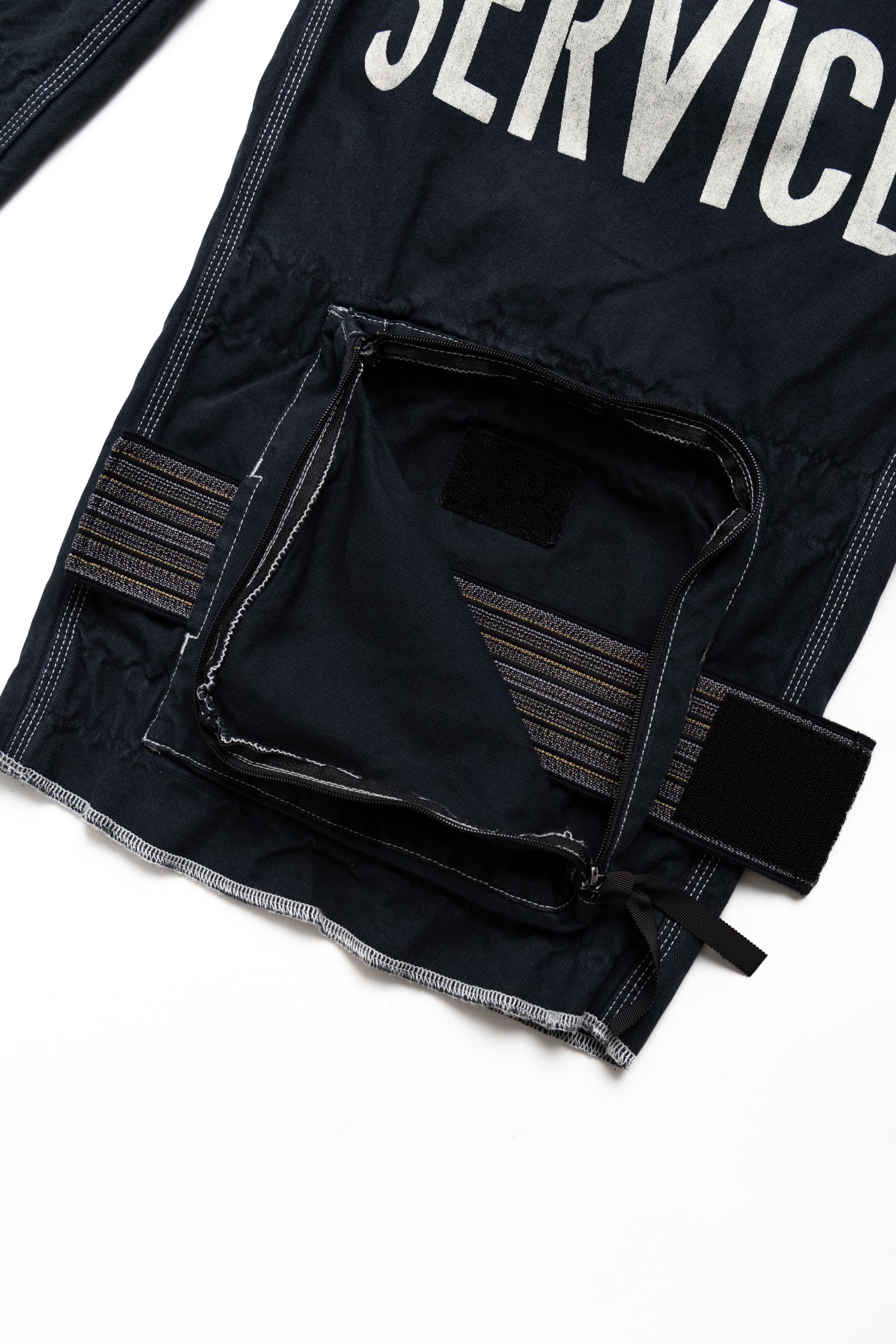 Canvas EAST REPAIR-MAN Track Pants - Black