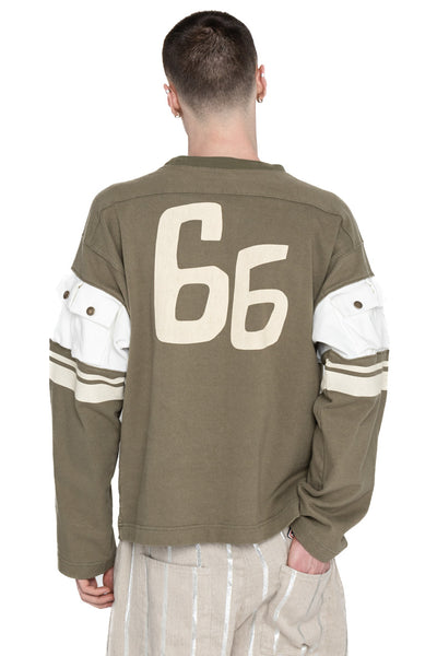 Kapital football long T-shirt made of thick and firm jersey. Utility pockets on the sleeve. Color: Khaki Made in Japan 100% cotton