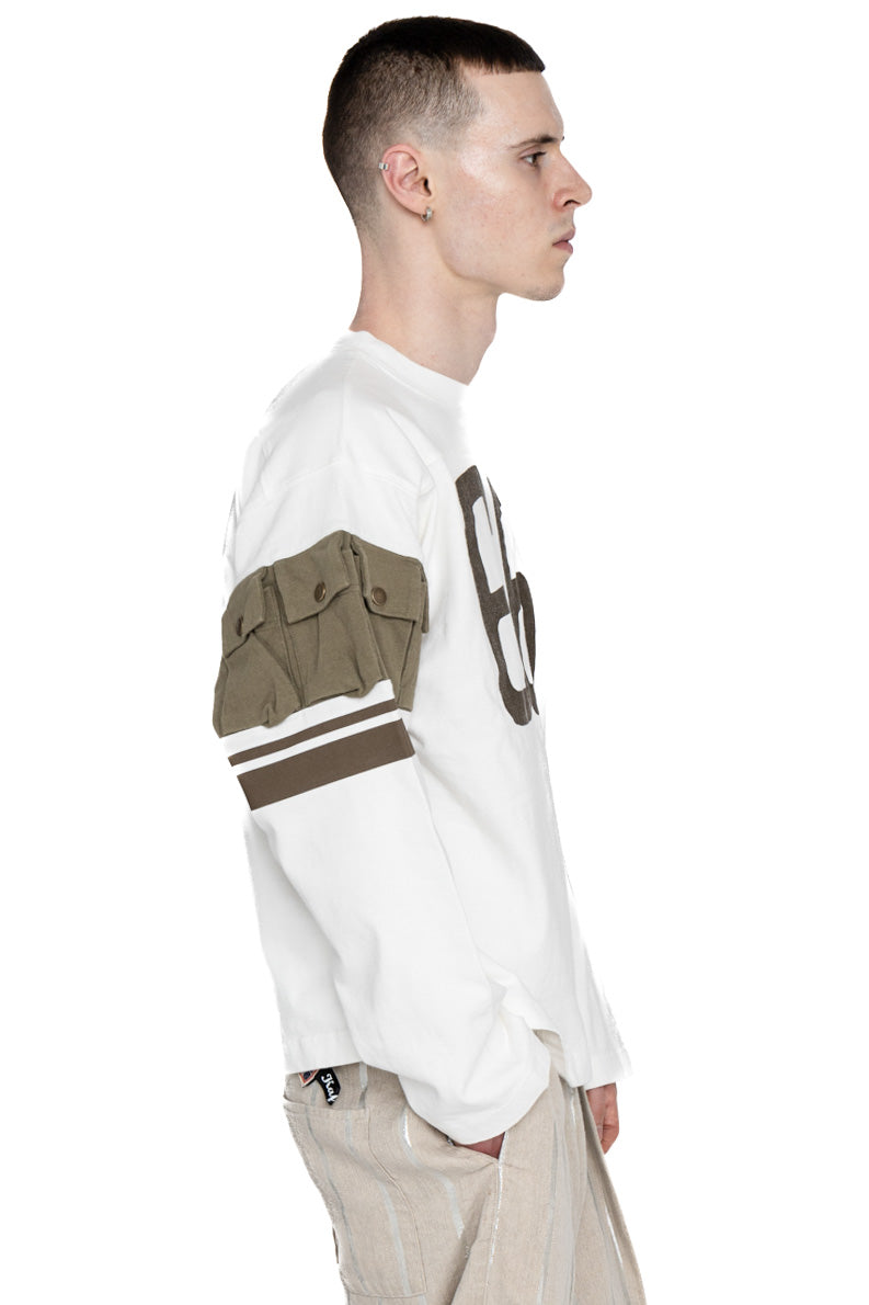 Kapital football long T-shirt made of thick and firm jersey. Utility pockets on the sleeve. Color: White  Made in Japan 100% cotton