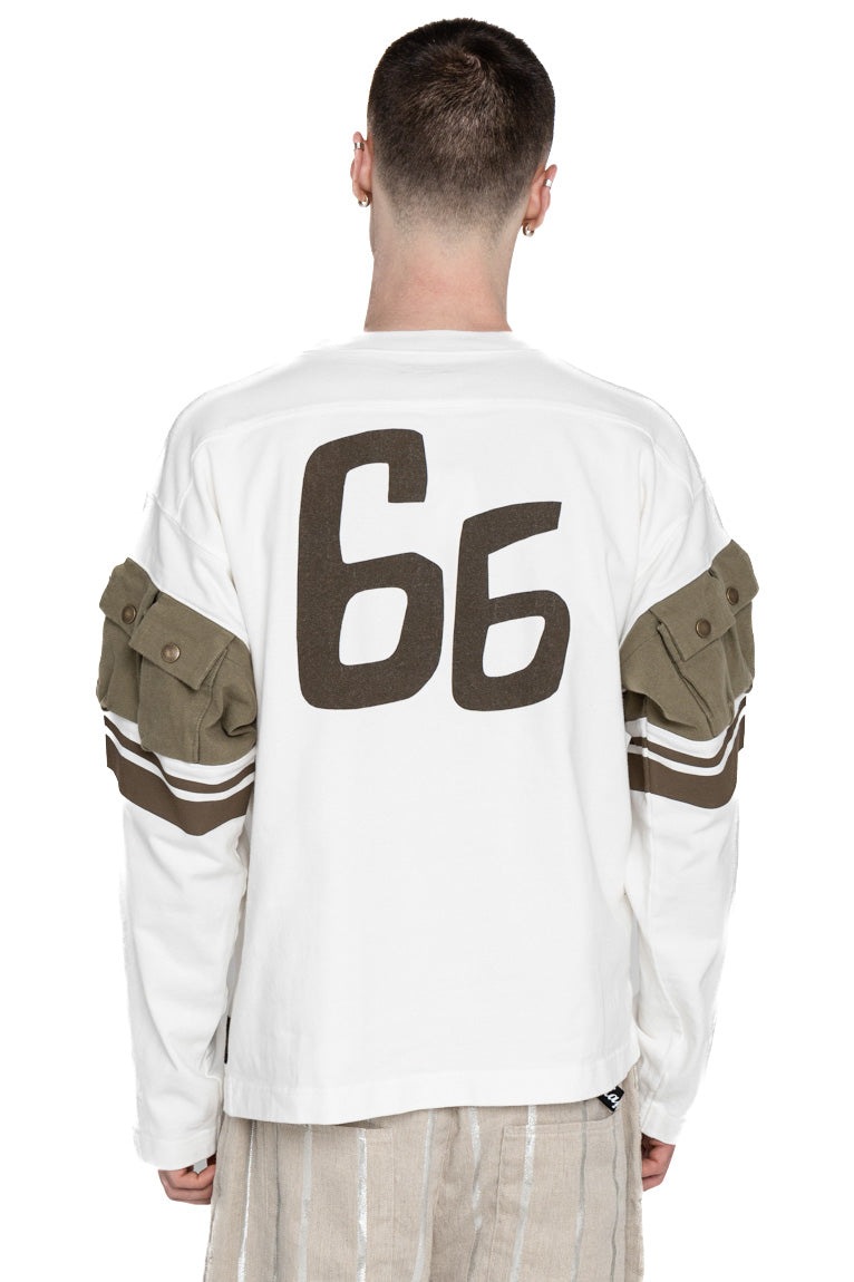 Kapital football long T-shirt made of thick and firm jersey. Utility pockets on the sleeve. Color: White  Made in Japan 100% cotton