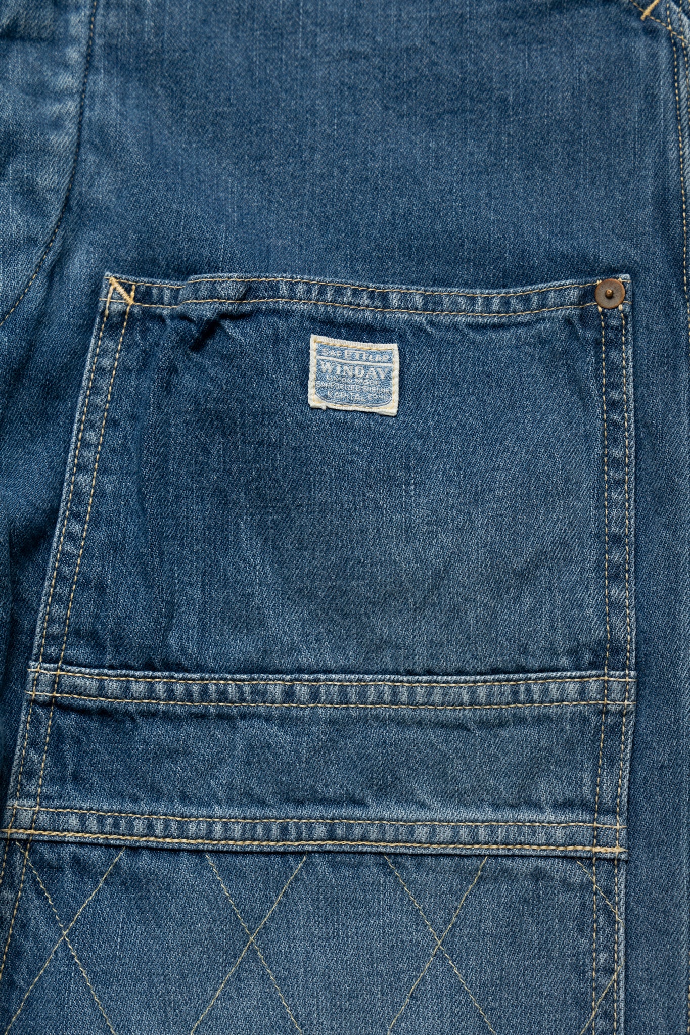 Kapital loose fitting pants inspired by overalls. A number of pockets are in various places, replicating cargos and overalls. Intentional distressing. Color:Faded indigo. 100% Cotton Made in Japan 