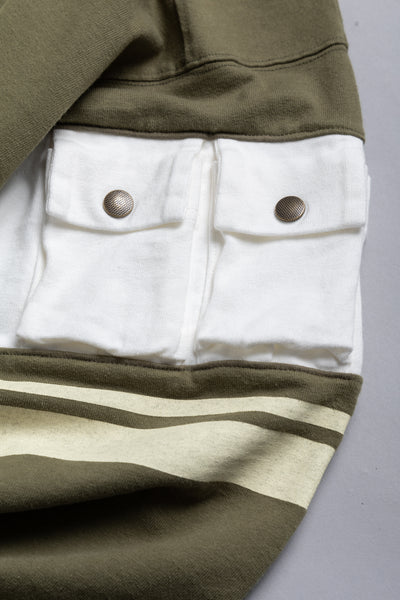Kapital football long T-shirt made of thick and firm jersey. Utility pockets on the sleeve. Color: Khaki Made in Japan 100% cotton