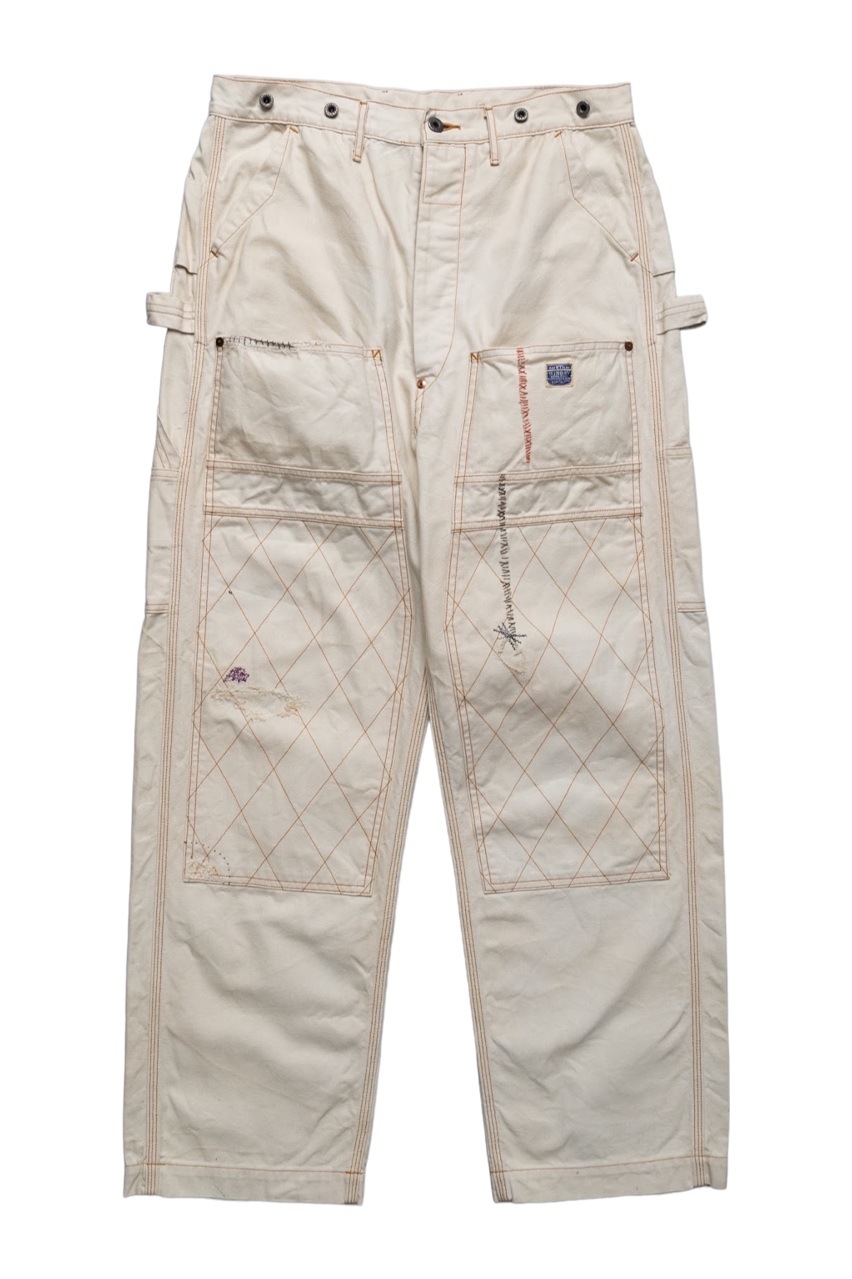 Made by Kapital are lumber pants inspired by overalls. Intricate stitching and intentional distressed details throughout front on pants. Loose fit. 100% Cotton. Made in Japan 