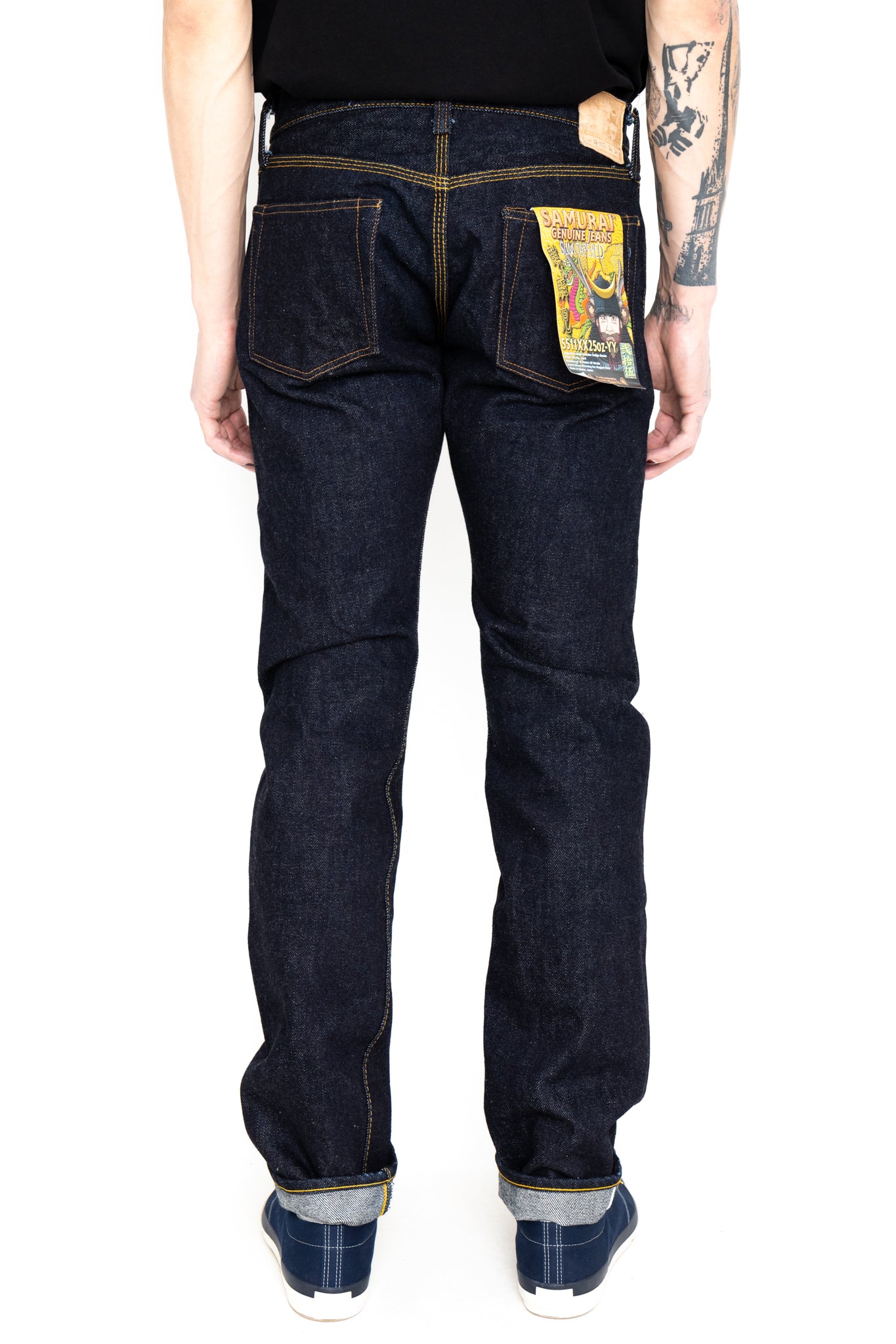 Samurai Jeans has released a limited edition"Kirinji" denim that rivals the rest. Coming in at 25oz, it is a true dark denim staple. Slim tapered in design, the jeans feature hidden rivets and an Iron Matsunoki button (tribute the laurel button and change the design to a lucky pine tree), and a Deerskin patch. 100% Cotton. Indigo (rope dyed). Made in Japan. Model is 6'3 and wearing a size 34. Unisex. 