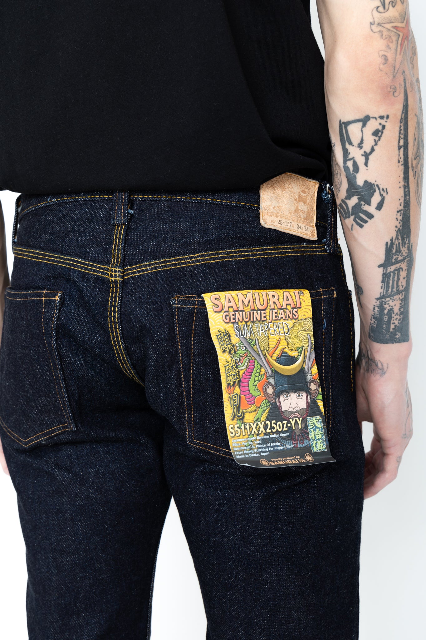 Samurai Jeans has released a limited edition"Kirinji" denim that rivals the rest. Coming in at 25oz, it is a true dark denim staple. Slim tapered in design, the jeans feature hidden rivets and an Iron Matsunoki button (tribute the laurel button and change the design to a lucky pine tree), and a Deerskin patch. 100% Cotton. Indigo (rope dyed). Made in Japan. Model is 6'3 and wearing a size 34. Unisex. 