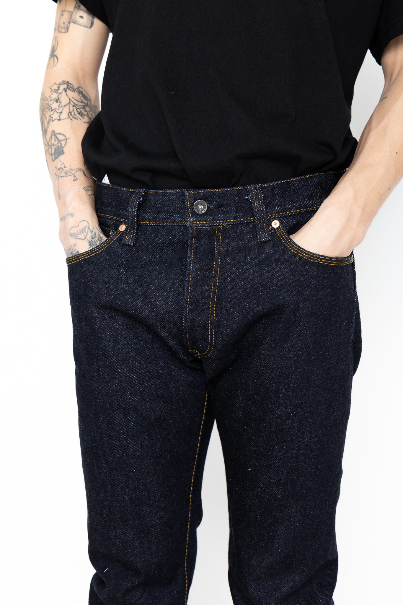 Samurai Jeans has released a limited edition"Kirinji" denim that rivals the rest. Coming in at 25oz, it is a true dark denim staple. Slim tapered in design, the jeans feature hidden rivets and an Iron Matsunoki button (tribute the laurel button and change the design to a lucky pine tree), and a Deerskin patch. 100% Cotton. Indigo (rope dyed). Made in Japan. Model is 6'3 and wearing a size 34. Unisex. 