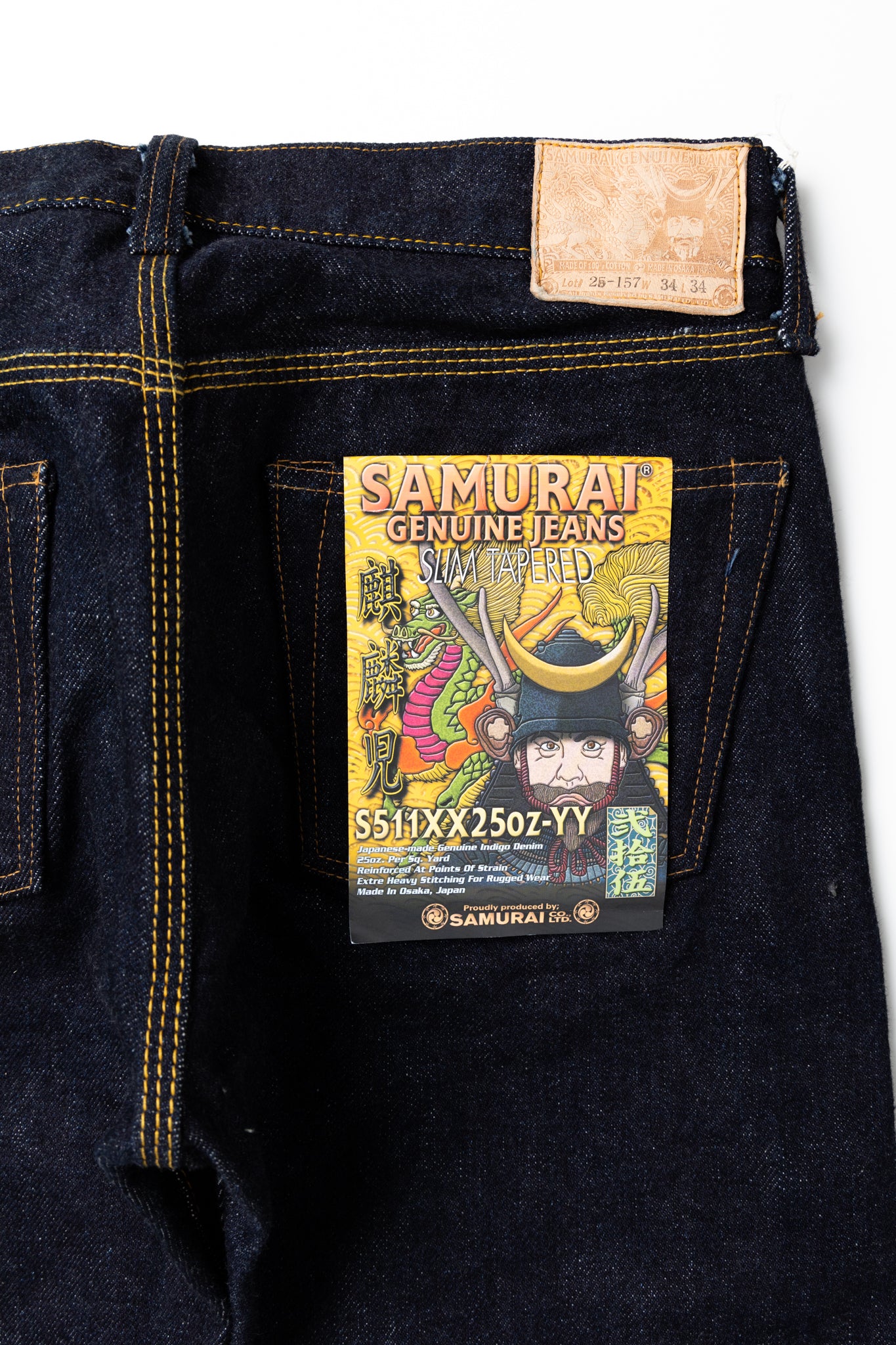 Samurai Jeans has released a limited edition"Kirinji" denim that rivals the rest. Coming in at 25oz, it is a true dark denim staple. Slim tapered in design, the jeans feature hidden rivets and an Iron Matsunoki button (tribute the laurel button and change the design to a lucky pine tree), and a Deerskin patch. 100% Cotton. Indigo (rope dyed). Made in Japan. Model is 6'3 and wearing a size 34. Unisex. 