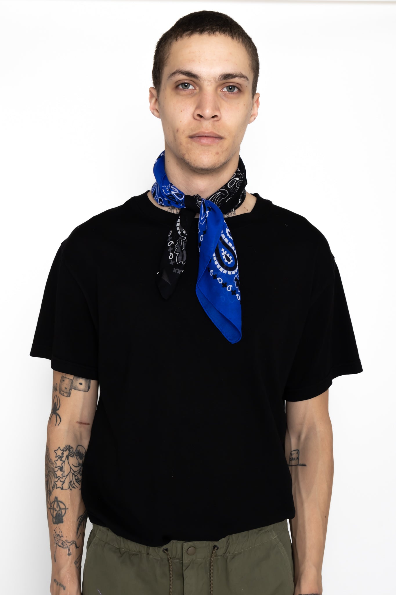 Destin Italian made Bandana. Color: Black x Blue 2 tone Extra fine cotton Light and soft touch 100% cotton Made in Italy Size: 23.5" x 23.5". Use as multipurpose scarf or bandana wrap. Unisex.
